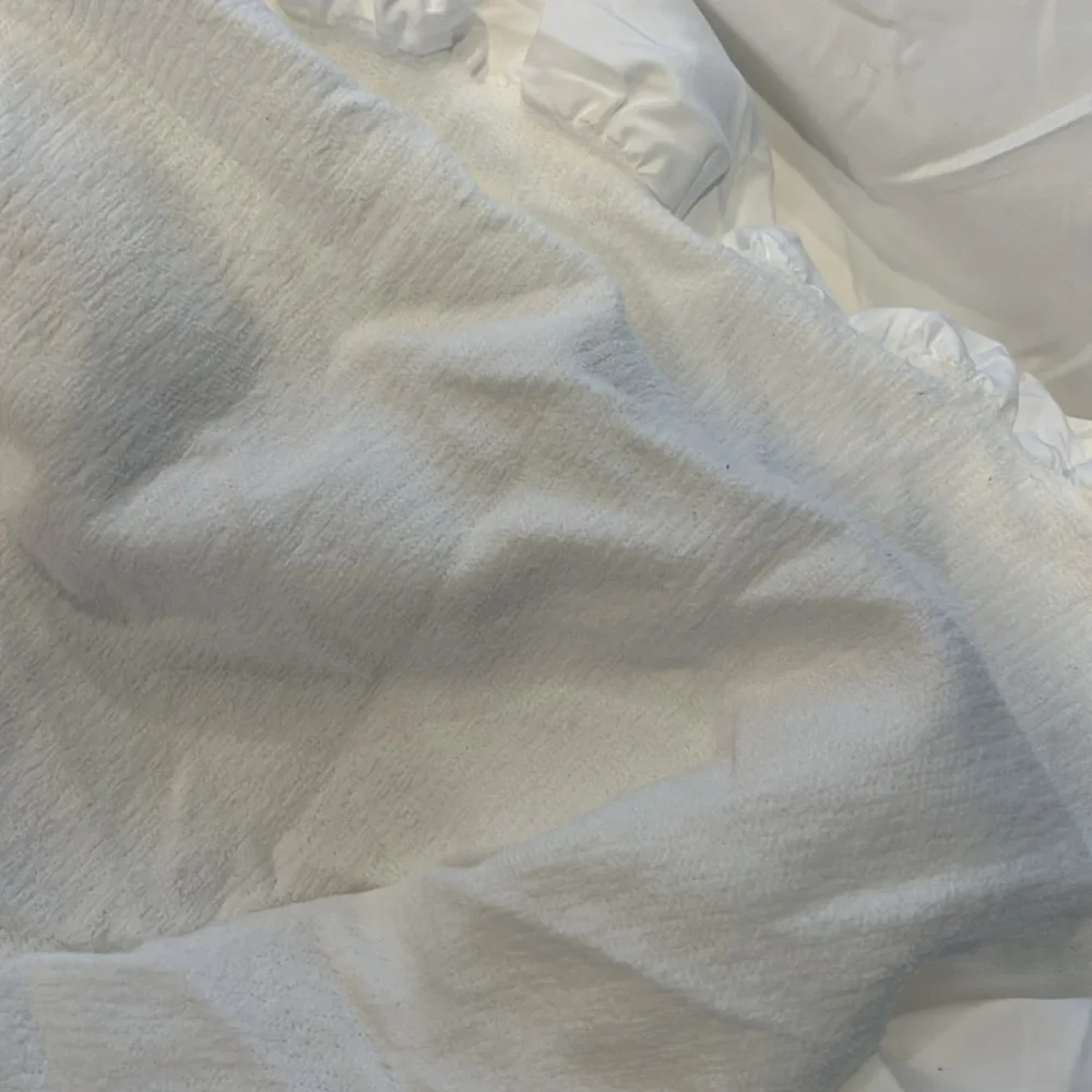 Twin  mattress cover .  Polyester - lightweight.  Deep mattress sides.